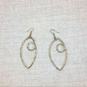 Fun gold tone Picasso Eye earrings
